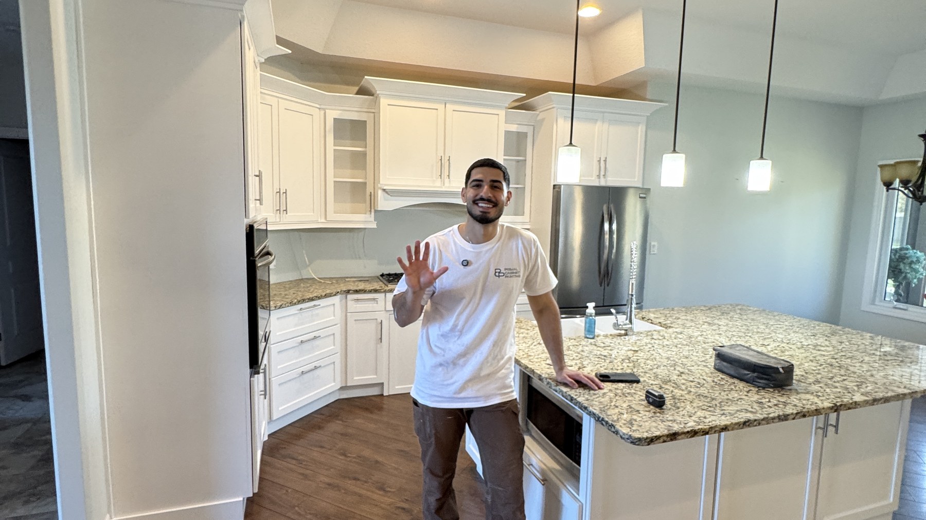 Primal Paints refinishing kitchen cabinets on a Windsor project Primal Paints refinishing kitchen cabinets on a Windsor project