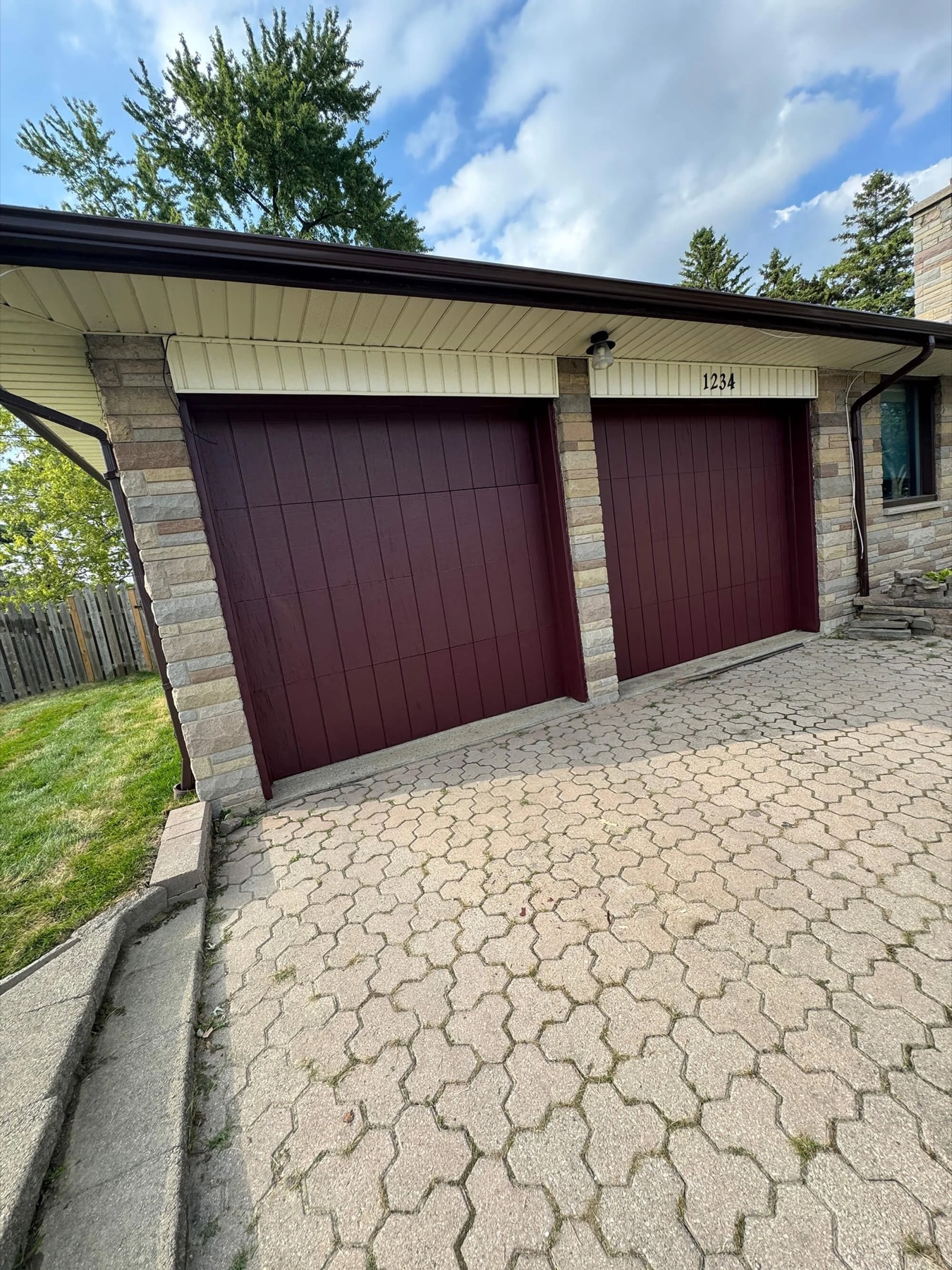Garage door and exterior trim repaint on an Amherstburg home Garage door and exterior trim repaint on an Amherstburg home